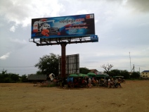 This billboard forms a rendezvous point for locals in this little town.