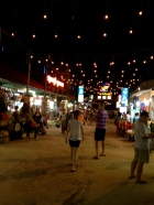 Once dark local streets, the path from Pub Street to the Night Market in Siem Reap is now an unbroken series of stalls and neon lights.