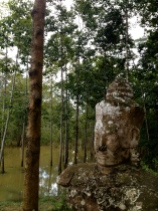 This warrior is one of a number who have stood guard for centuries across the bridges at the entrances to Angkor Thom.